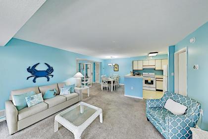 Oceanside Gem with Private Deck Canal Views  Pools condo